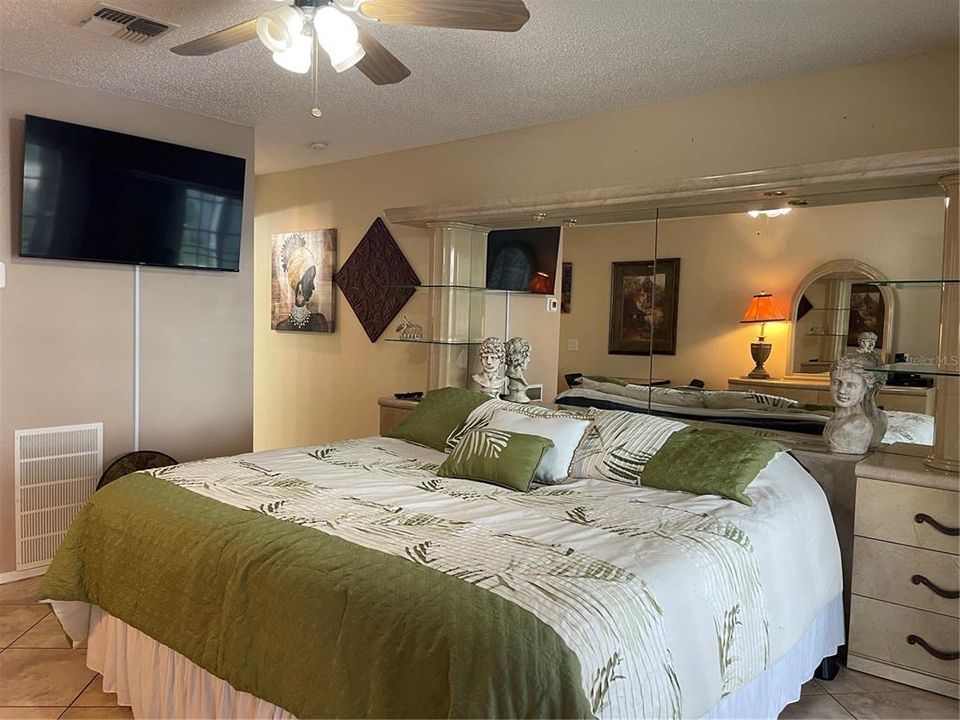 King size bed will convey with condo