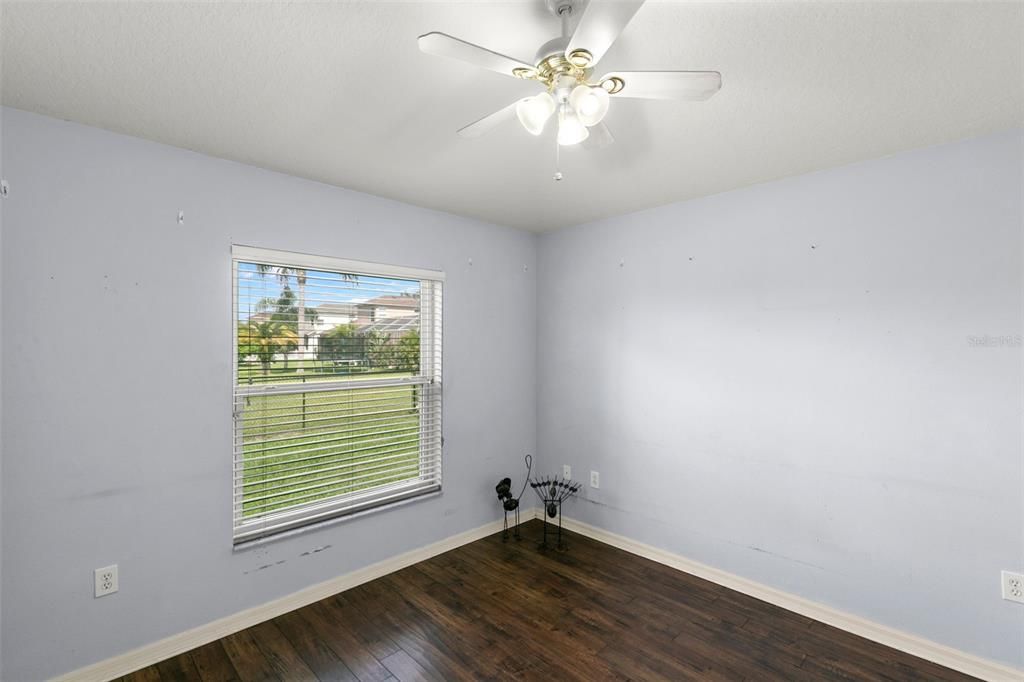 Bedroom with laminate flooring