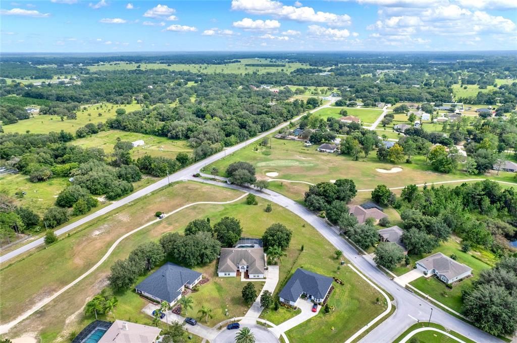 Aerial view of Eustis Court, golf cart roads, private roads, streets