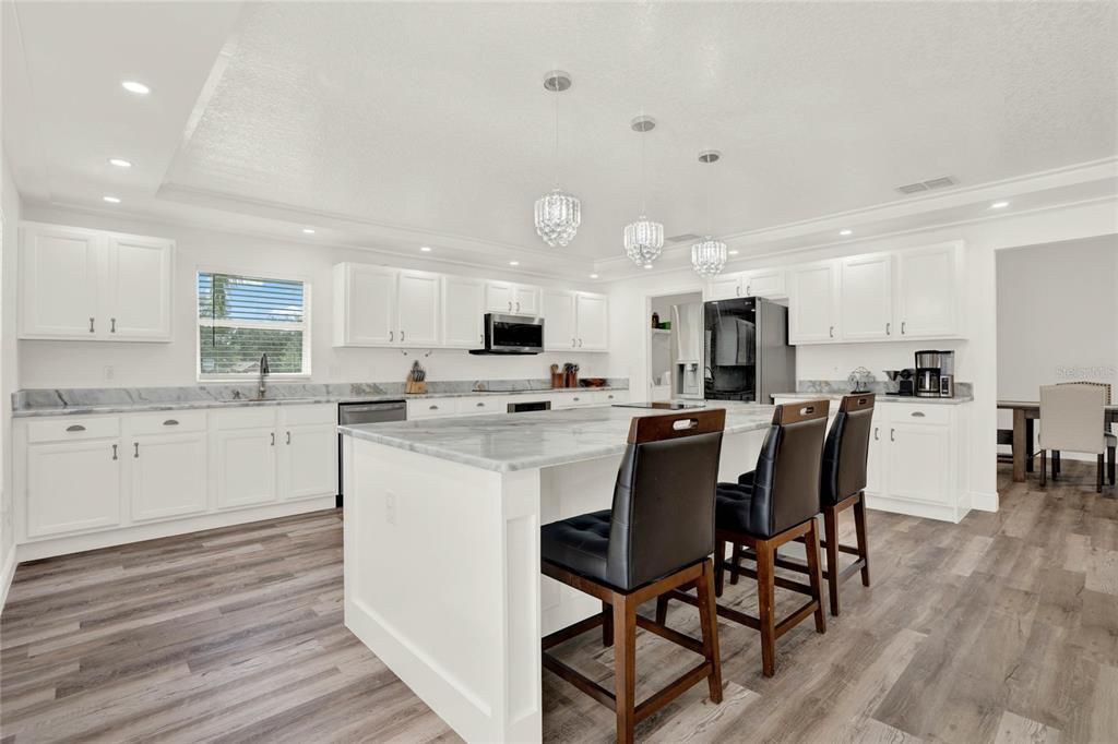 kitchen photo w/ counter chairs