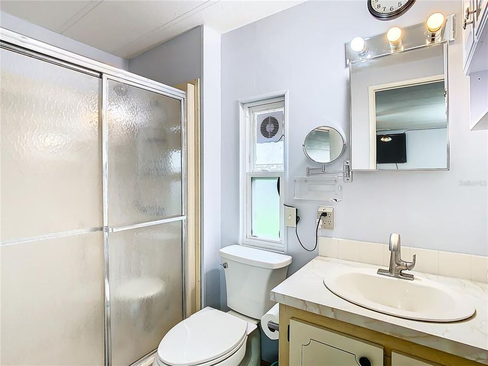 Primary bath with walk-in shower.