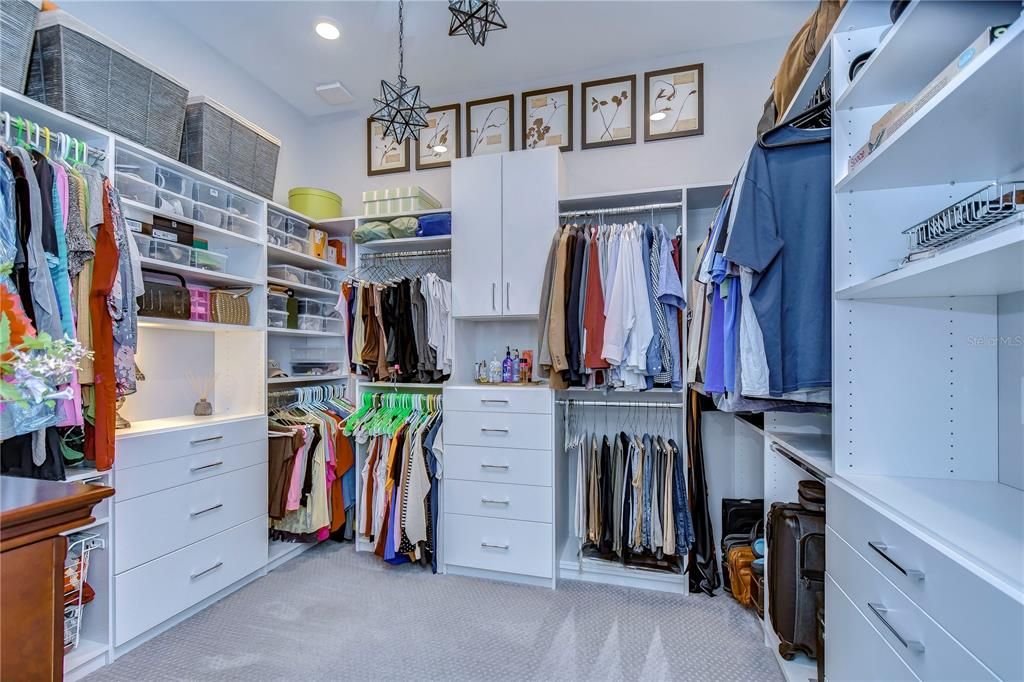 Custom designed primary bedroom closet (11x12)