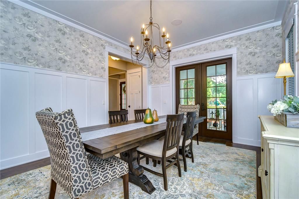 Main dining room w/double doors to front porch