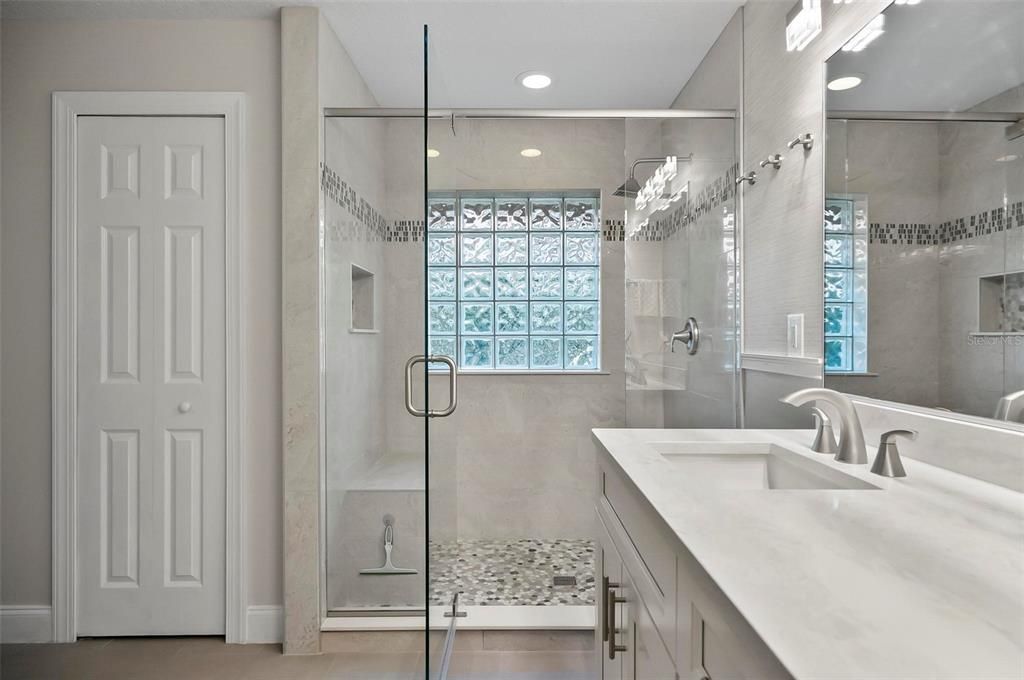 Boutique Style Shower, Complete with Bench and Niche and Decorator Tile Finishes