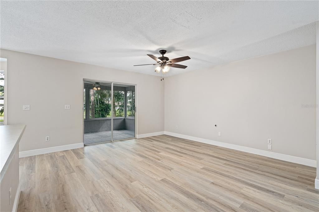 Living room and door to enclosed florida room under air