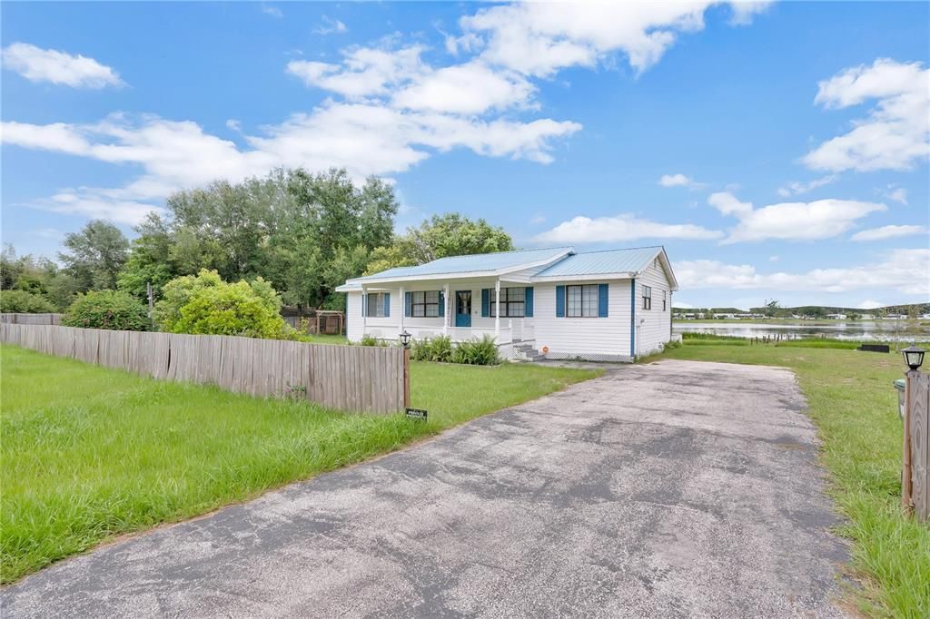 Front Exterior with Driveway and Lake View