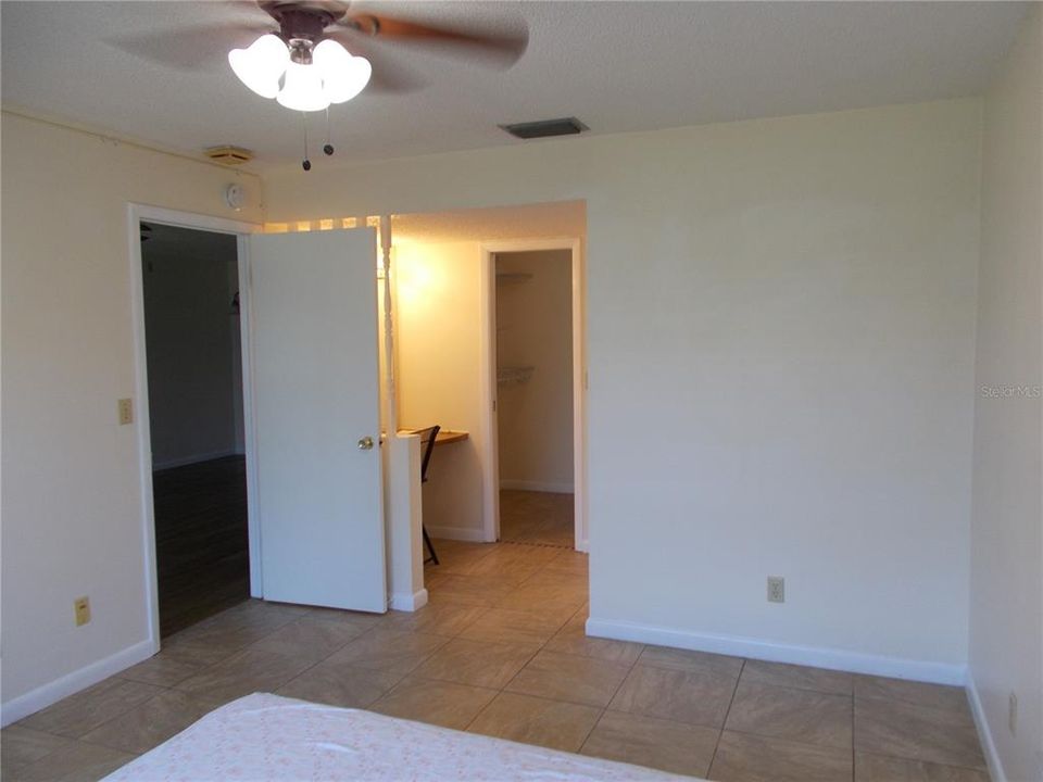 The Master Bedroom viewed from another side to show the Vanity outside the bathroom..