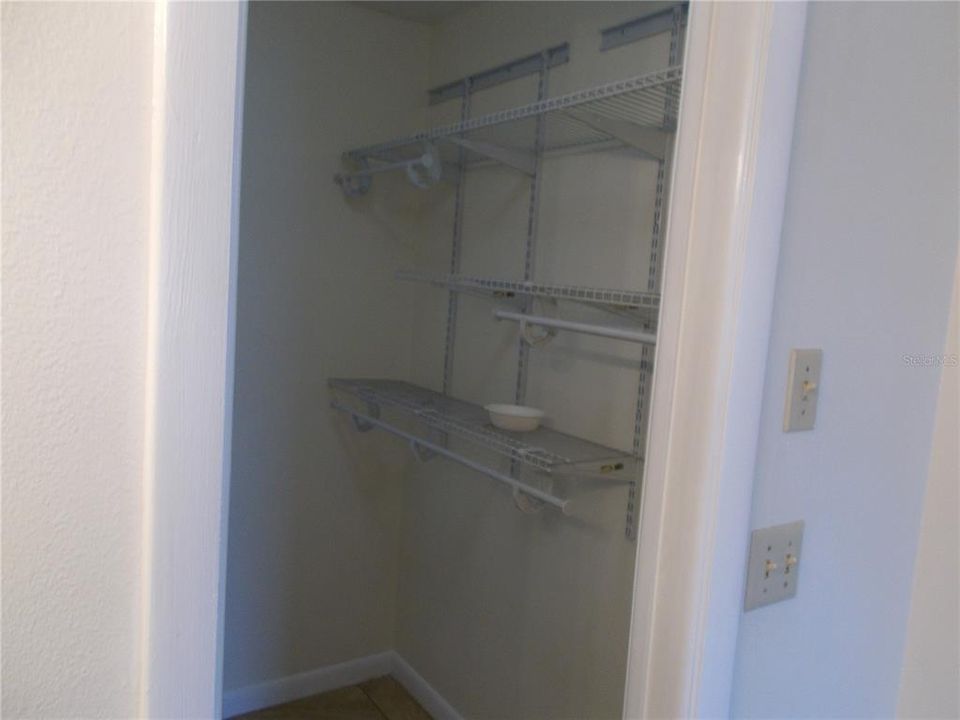 Another view of the walk in closet.