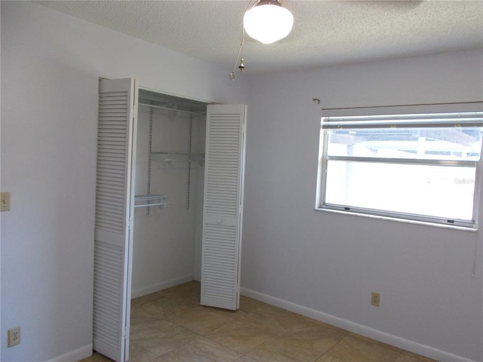 The Guest Bedroom with the built-in closet.