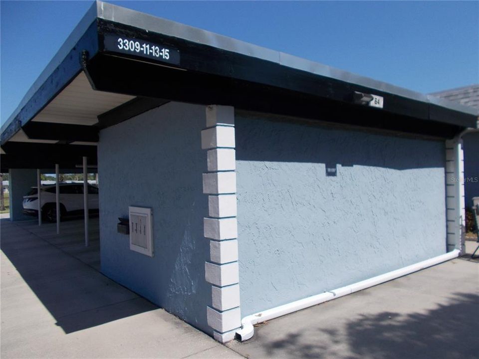 The storage area for the residents. Also, the front shows the mailboxes.