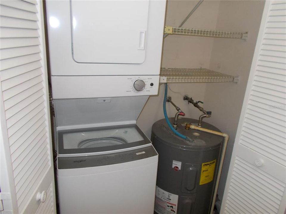 The washer/dryer combo and the water heater in the closet in the kitchen.