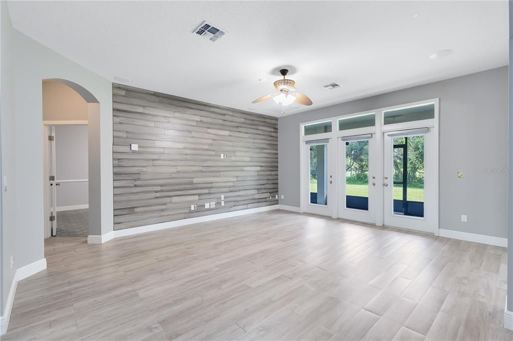 Main Living Room view to oversized screened in back porch