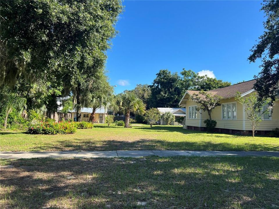 Street view of property and additional green space