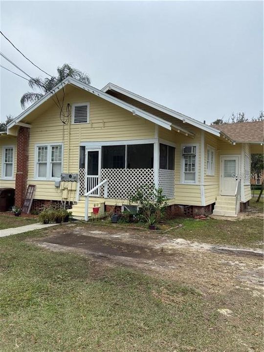 Picture of rear of main house and 1 br/1b efficiency with porch