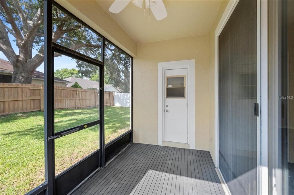 Screened-in back patio with Interlocking Deck Tiles