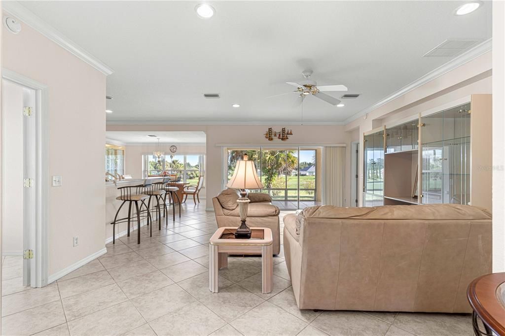 Foyer facing living room and kitchen/dining room