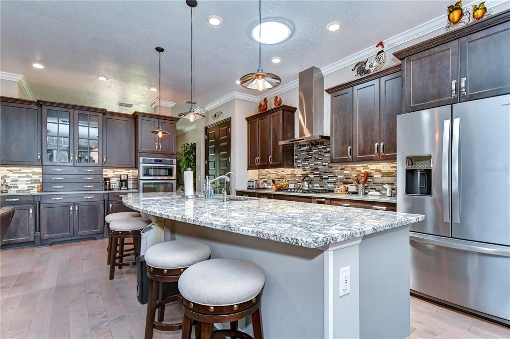 Premium stainless appliances & cabinets topped with crown add to the appeal!