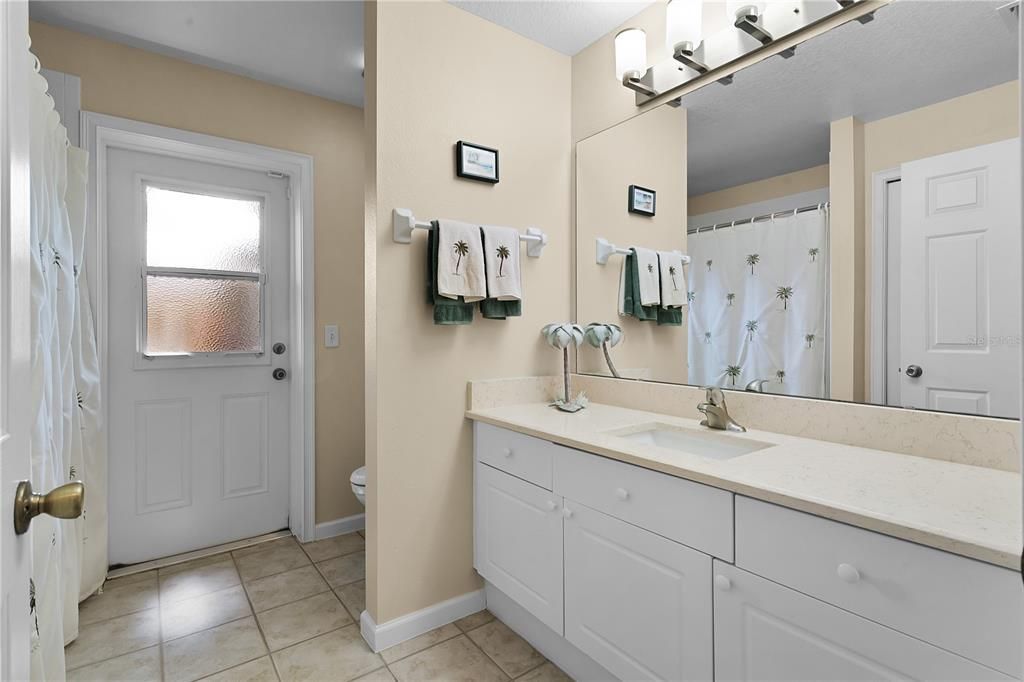 This well-appointed second bathroom offers a versatile shower/tub combination, perfect for both relaxing baths and quick showers. With clean finishes and ample space, it’s designed for both comfort and practicality, making it a great feature for family or guests.