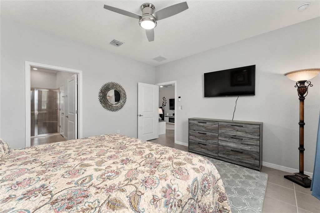 Primary Suite with ceiling fan