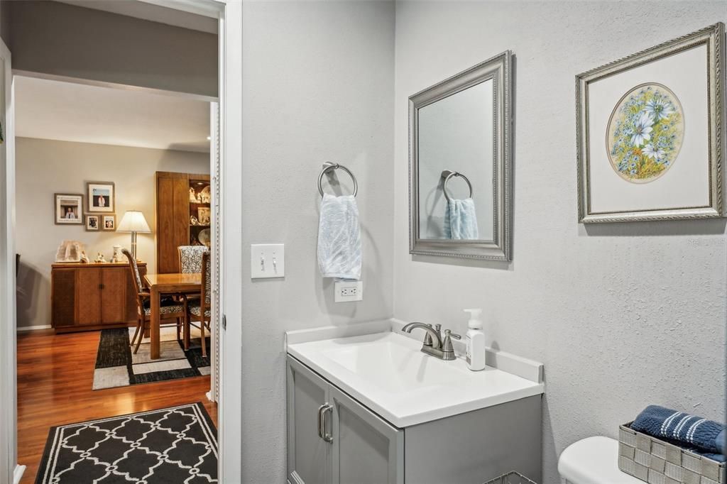 Guest bathroom looking out towards dining room.