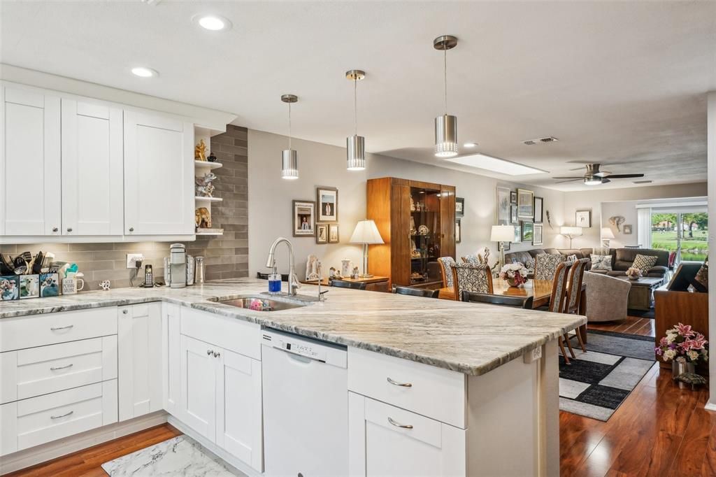 Updated lighting over large kitchen sink.