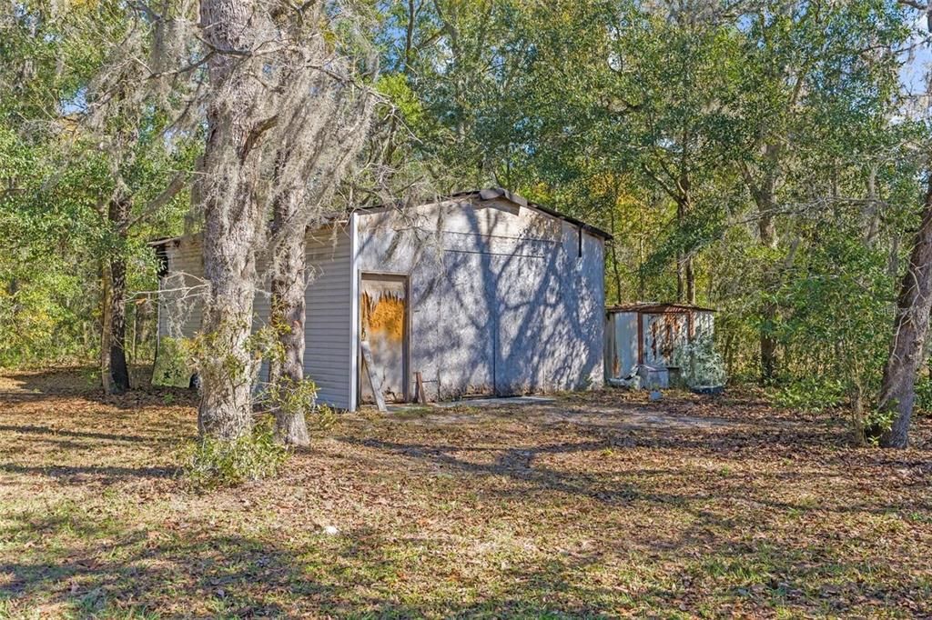 two storage sheds at the back of the property