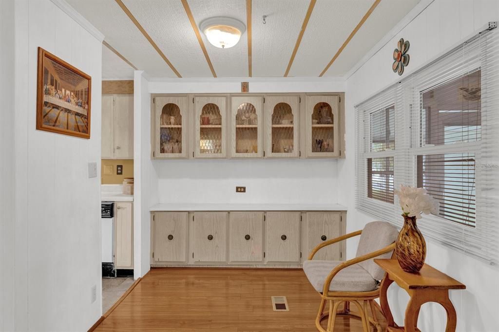 Upon entering the house, there's a wall full of cabinet storage