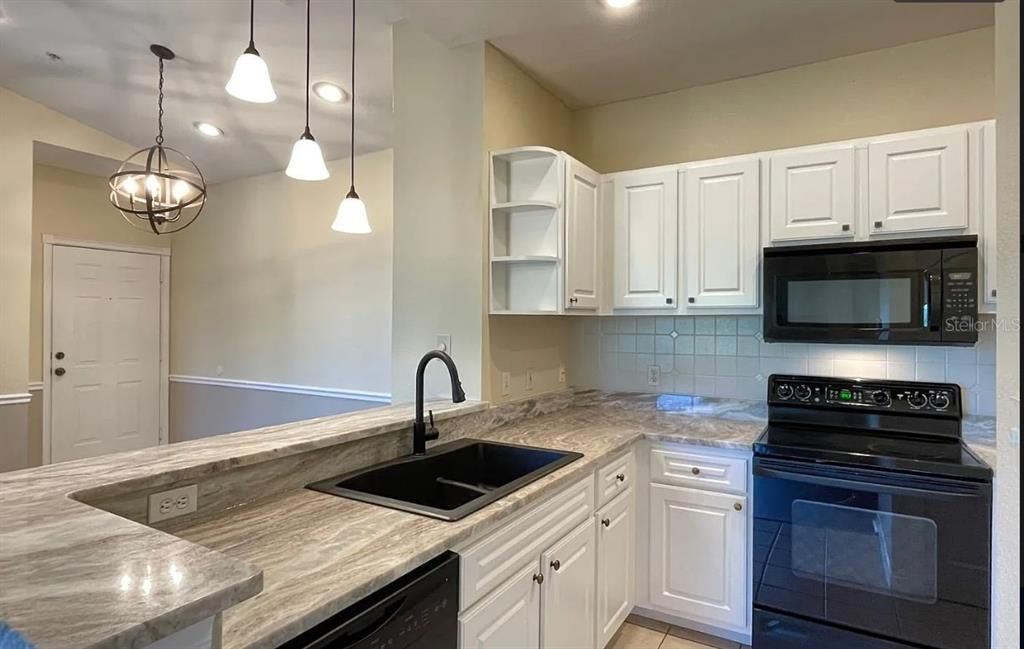 New kitchen cabinets with granite counters