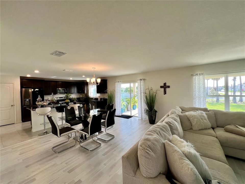 VIEW FROM THE FOYER AND DEN WITH HALF BATH