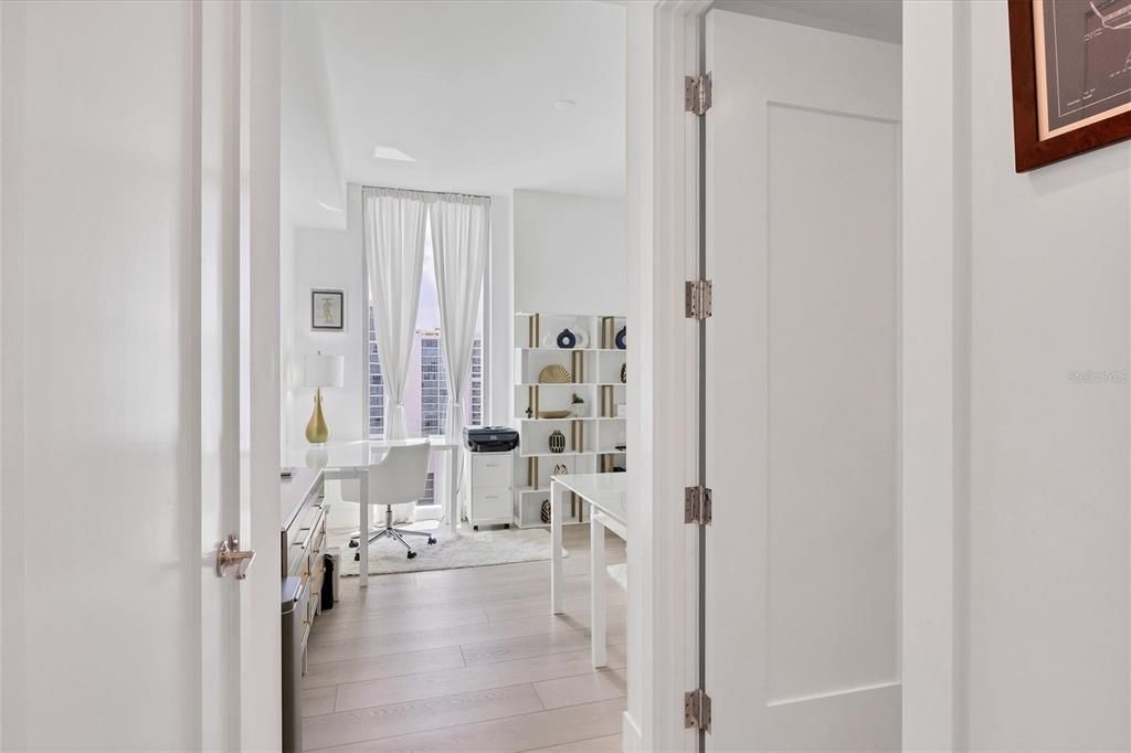 Second bedroom with en-suite bathroom and large built-in closet.