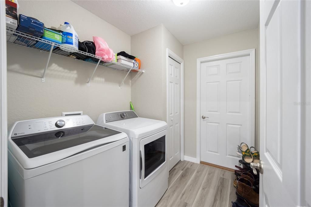 Laundry located between kitchen and garage