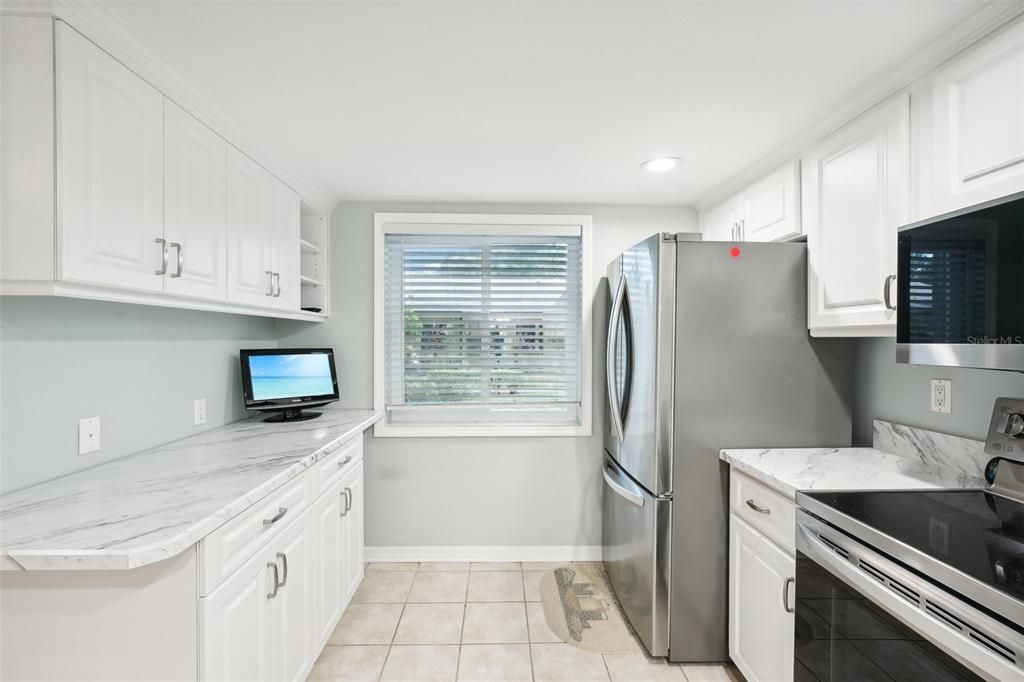 Kitchen with view of front yard