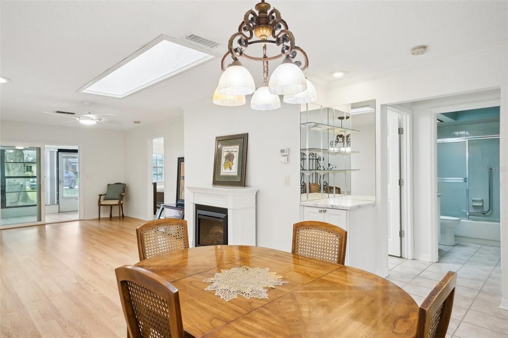 View from dining table into the guest bathroom on right