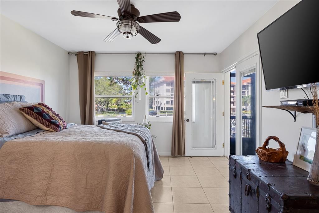 Large windows in the Primary Bedroom fill the room with natural light.