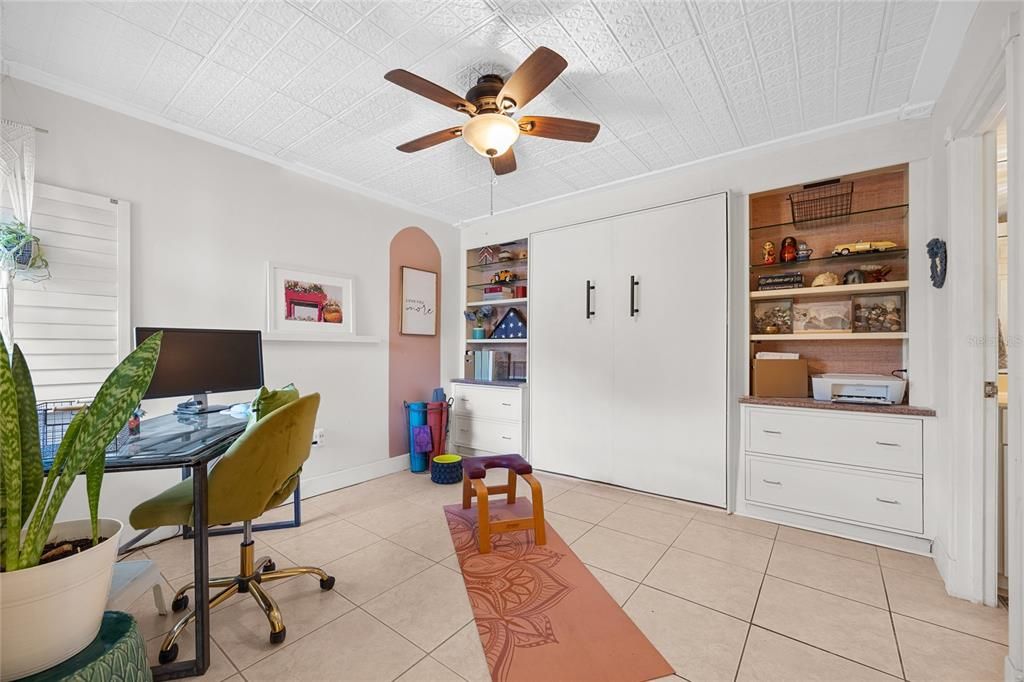 Bedroom #2 maximizes the space with a Murphy bed and built in storage.