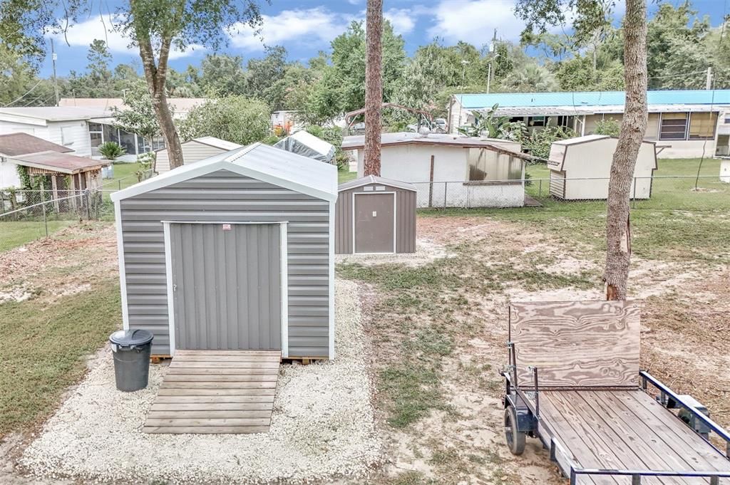 STORAGE SHED AND COVERED WELL