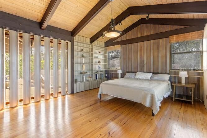 Primary Bedroom with vertical shutters