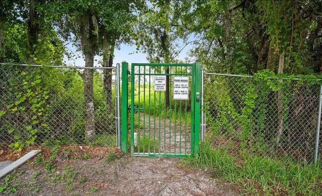 Private entrance at back of community to Nathan Benderson Park