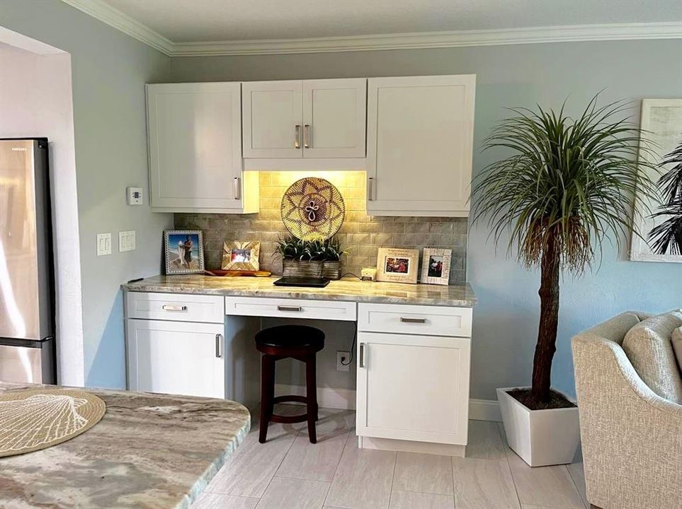 Desk with Kraftmaid cabinets with pull out drawers