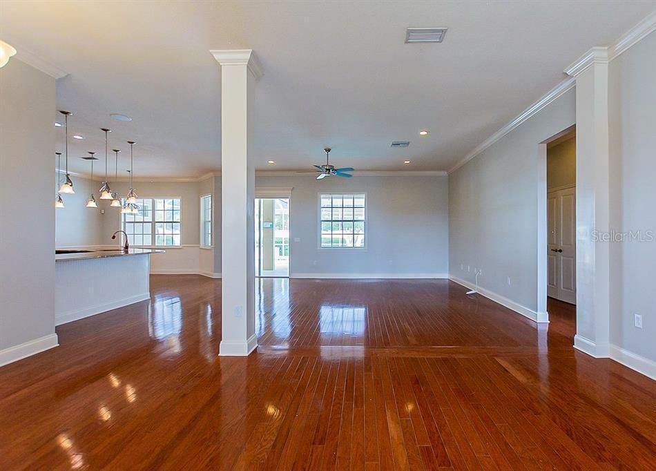 ANOTHER VIEW OF THE LIVINGROOM DINING ROOM AREA OVERLOOKING THE KITCHEN