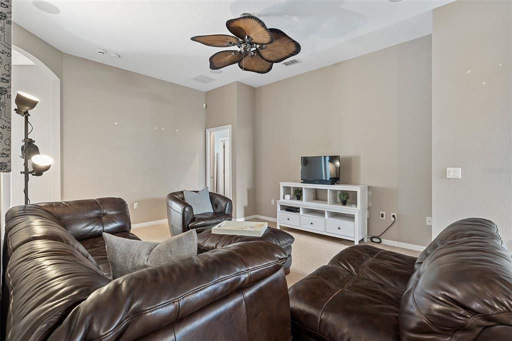 Spacious living room with high ceilings