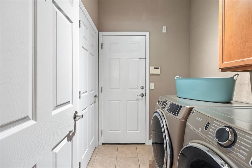 Adjacent to the kitchen is your laundry room with washer/dryer and direct access to the garage.