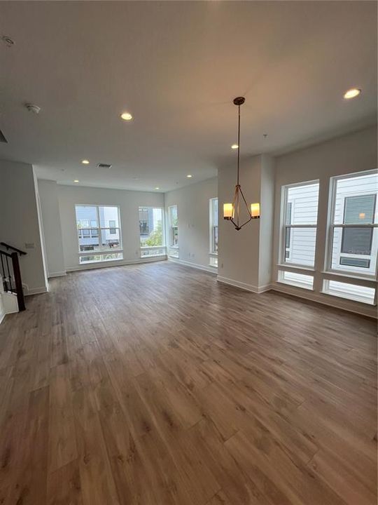 Casual dining and Great room - lots of natural lighting from windows