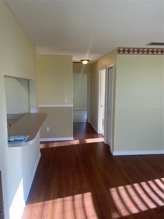 Living room and hall leading to two bedrooms and hall bathroom