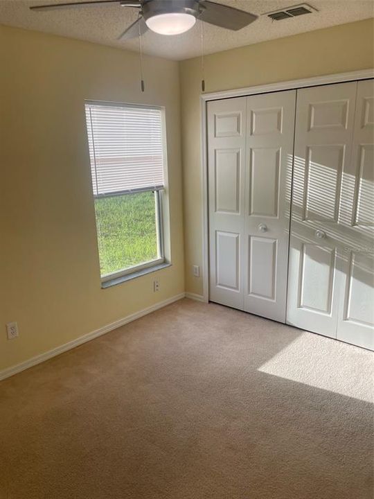 Bedroom #2 has double door closet