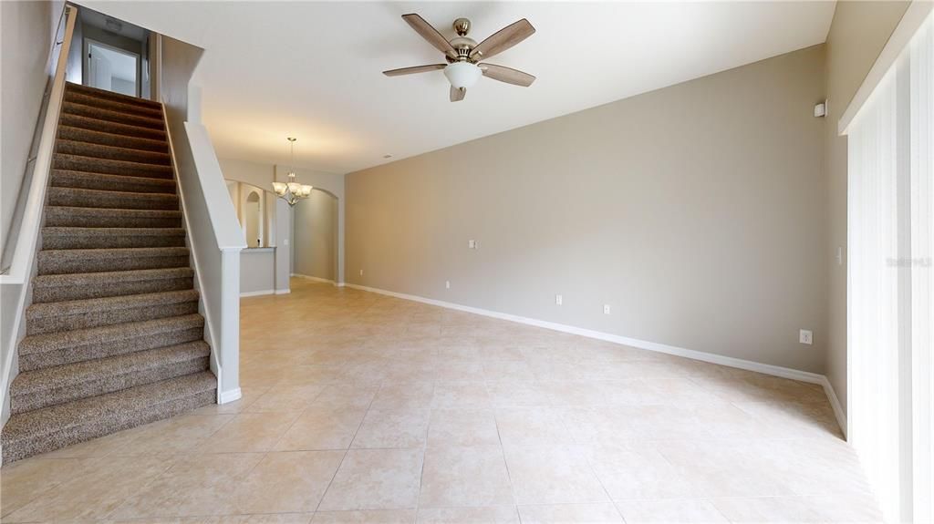 Family room area and stairs leading to second floor.