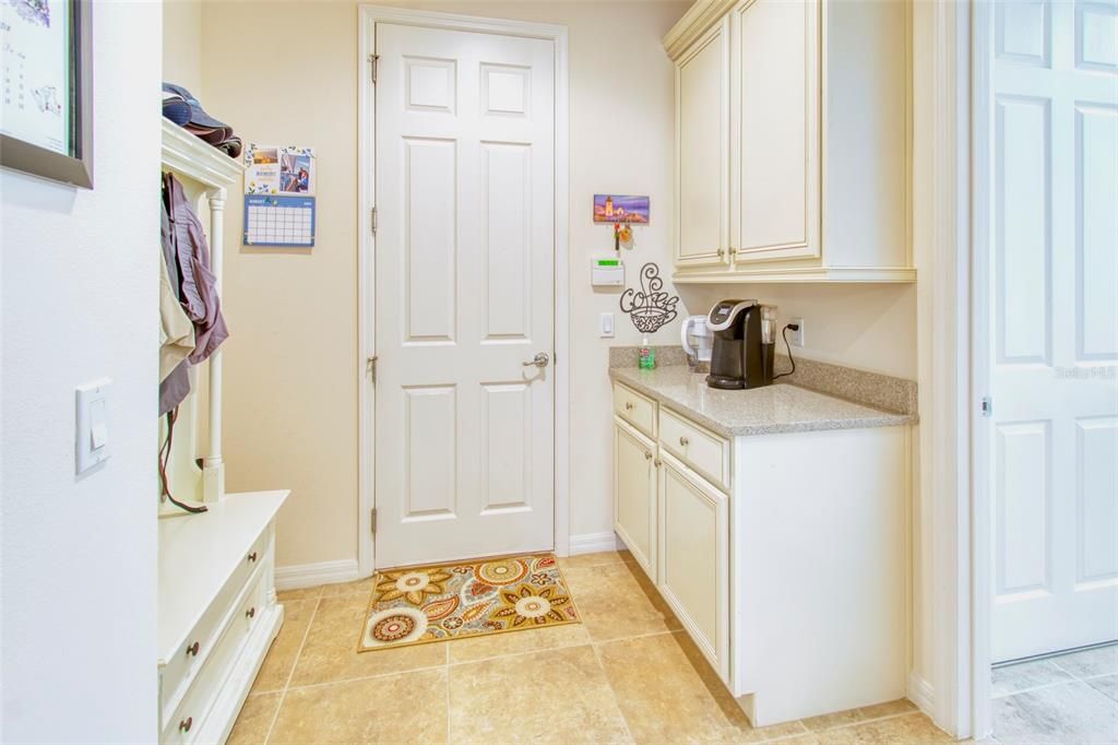 The laundry room is large and versatile