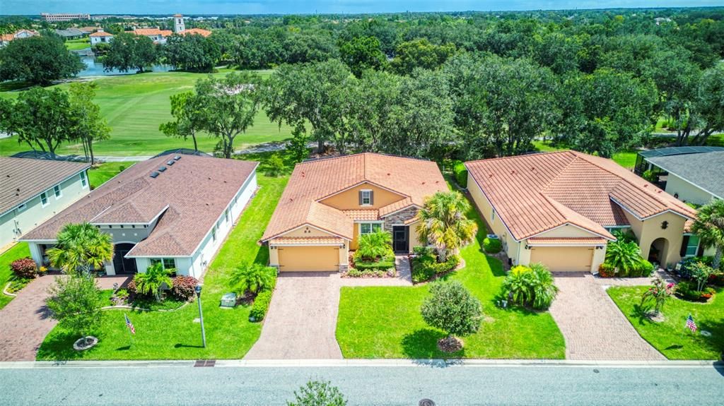 Larger homesites, mature oak trees, and the fairway define this awesome setting