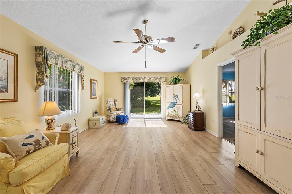 LIVING ROOM with DOORS TO BACKYARD