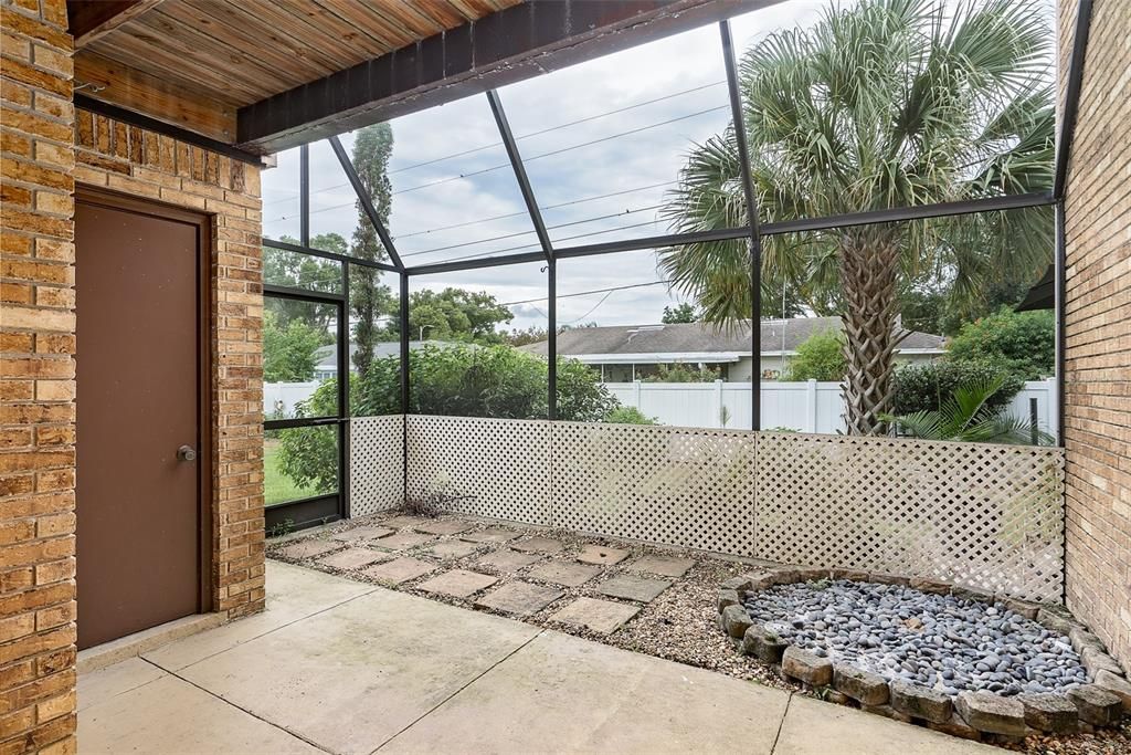 First floor view of patio and fire pit area. Storage closet to the left side of each floor.